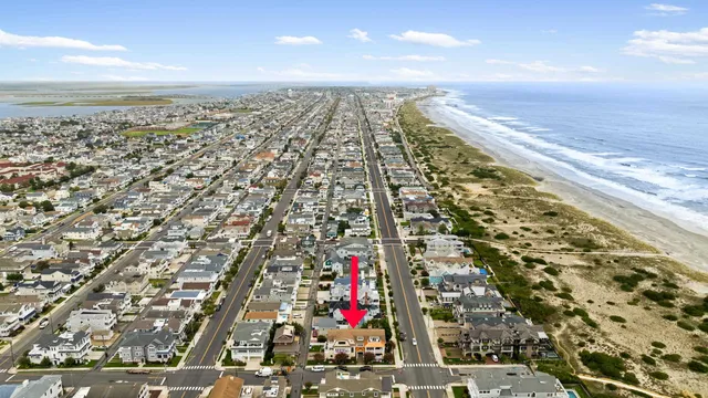 an aerial view of beach and ocean