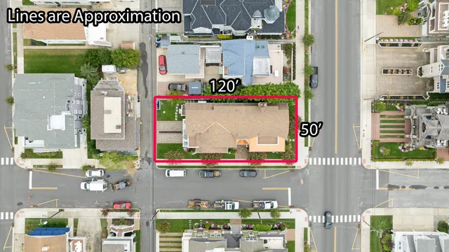 a street sign on a wall next to a building