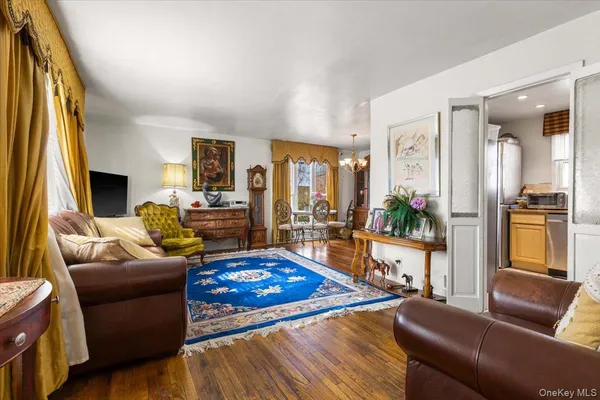 a living room with furniture fireplace and a flat screen tv