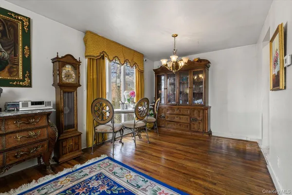 a living room with fireplace furniture and a window