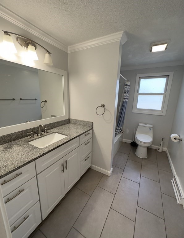 24 Emerson Street Springfield, MA 01118 - Photo 7 of 19 a bathroom with a granite countertop sink a toilet and a mirror