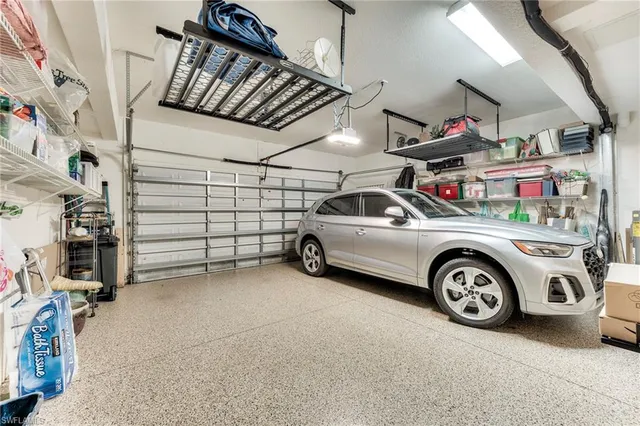 a view of a garage and car parked