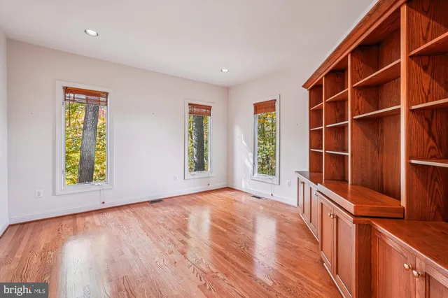 a view of a garage with wooden floor