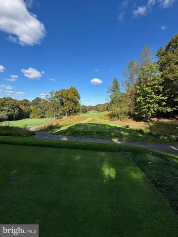 a view of a road with an outdoor space
