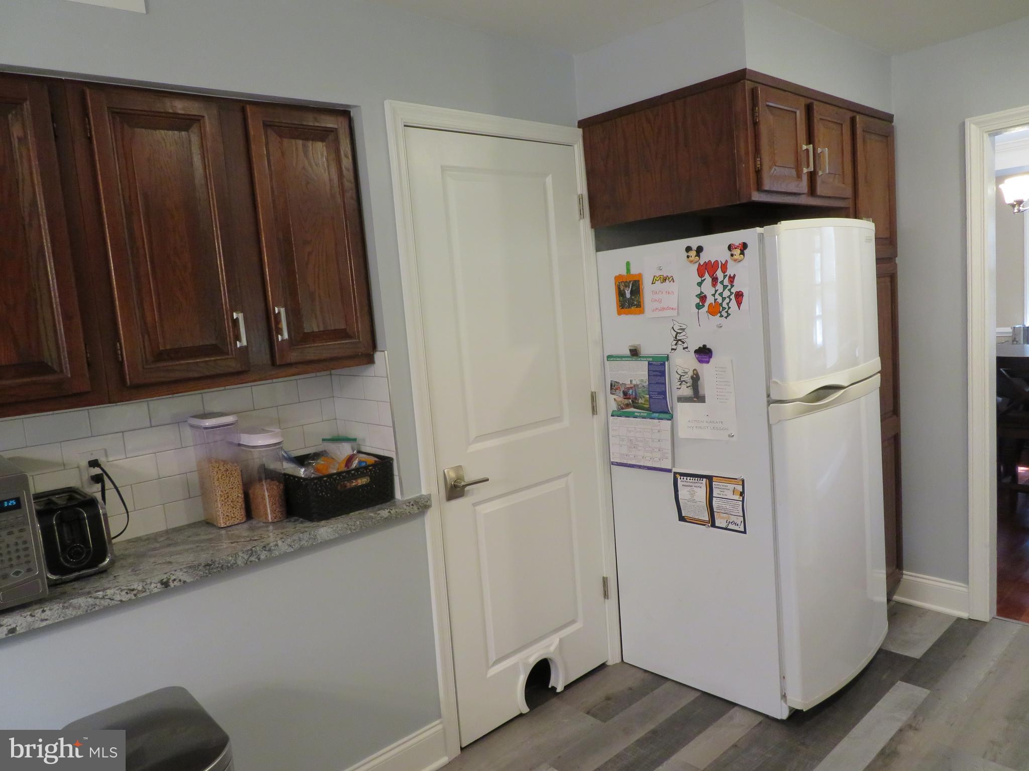 7630 Levis Road Cheltenham, PA 19012 - Photo 12 of 34 Kitchen, slide out drawers on other side of frig.