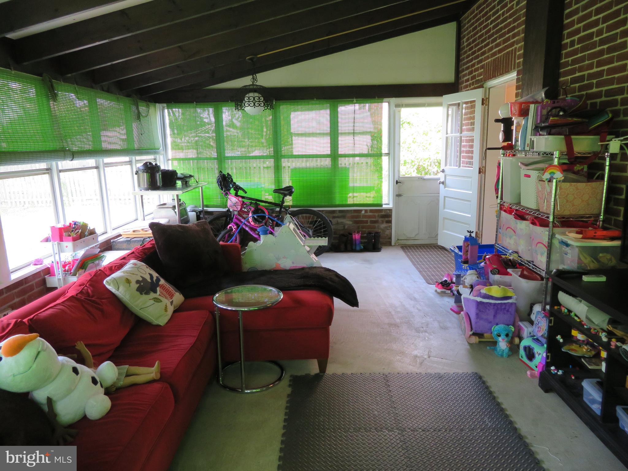 7630 Levis Road Cheltenham, PA 19012 - Photo 15 of 34 3 season room, lounging around and watching TV!