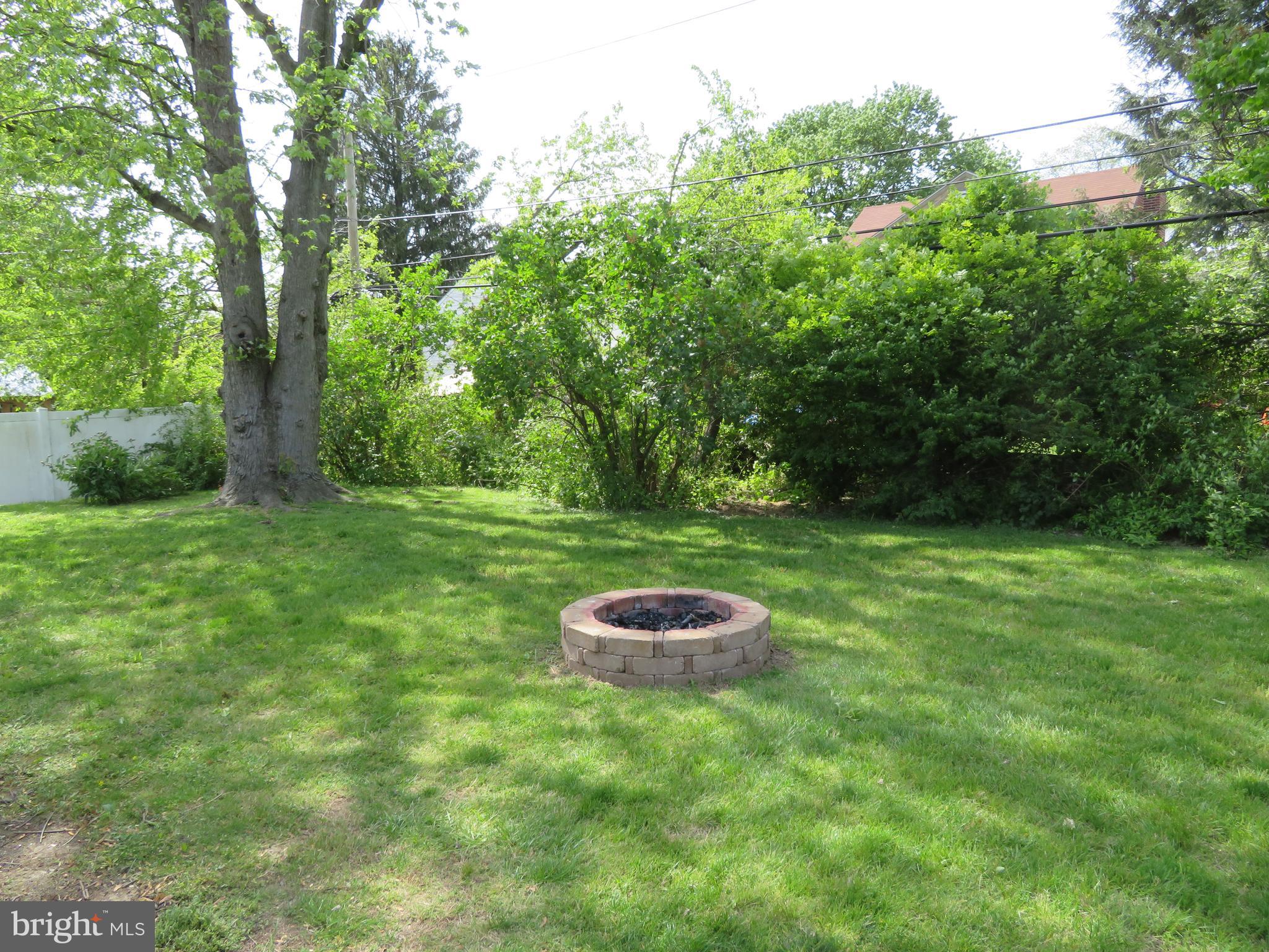 7630 Levis Road Cheltenham, PA 19012 - Photo 30 of 34 Level back yard for fun and games.