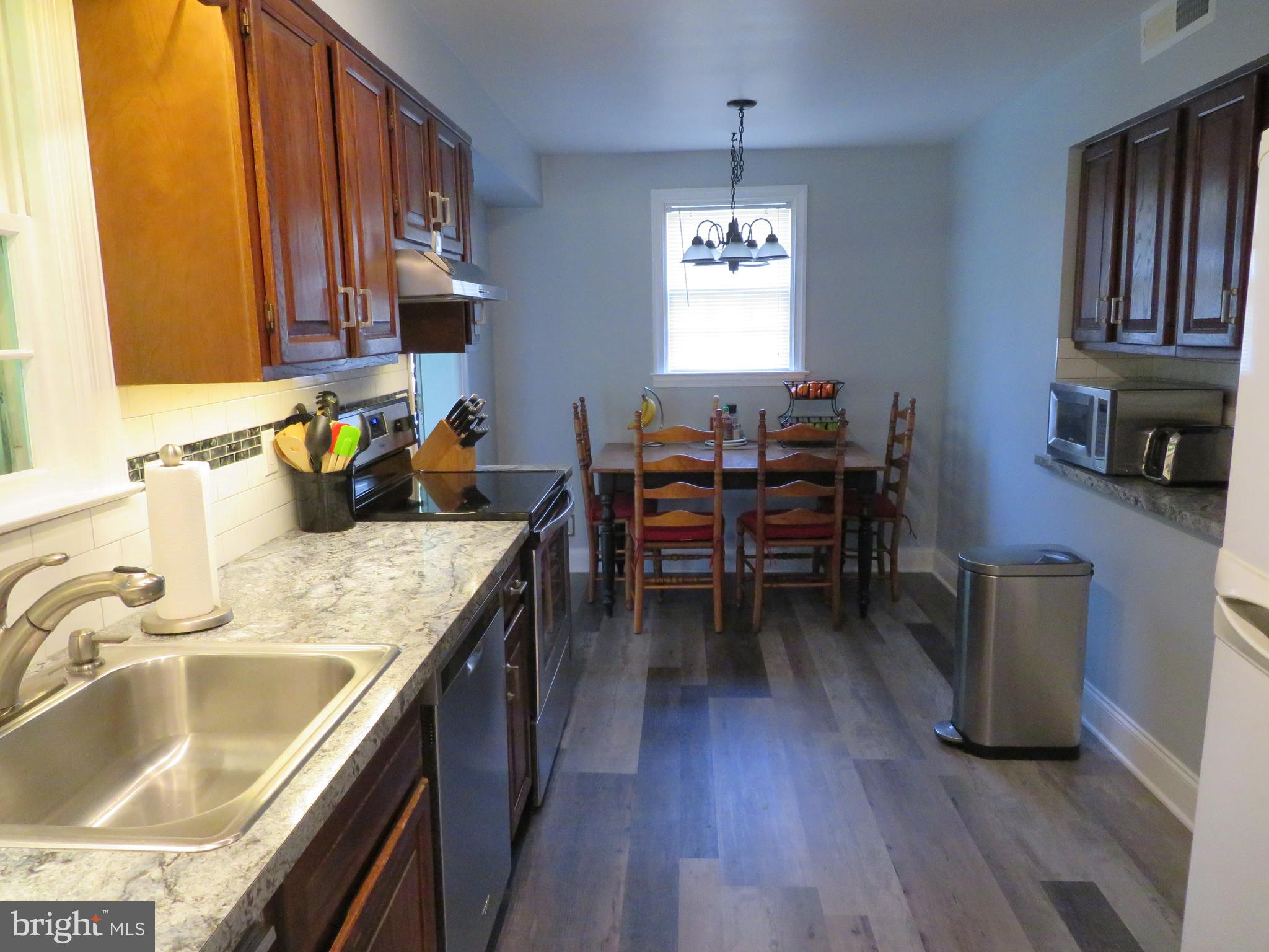 7630 Levis Road Cheltenham, PA 19012 - Photo 9 of 34 Kitchen, note the breakfast nook and new flooring.