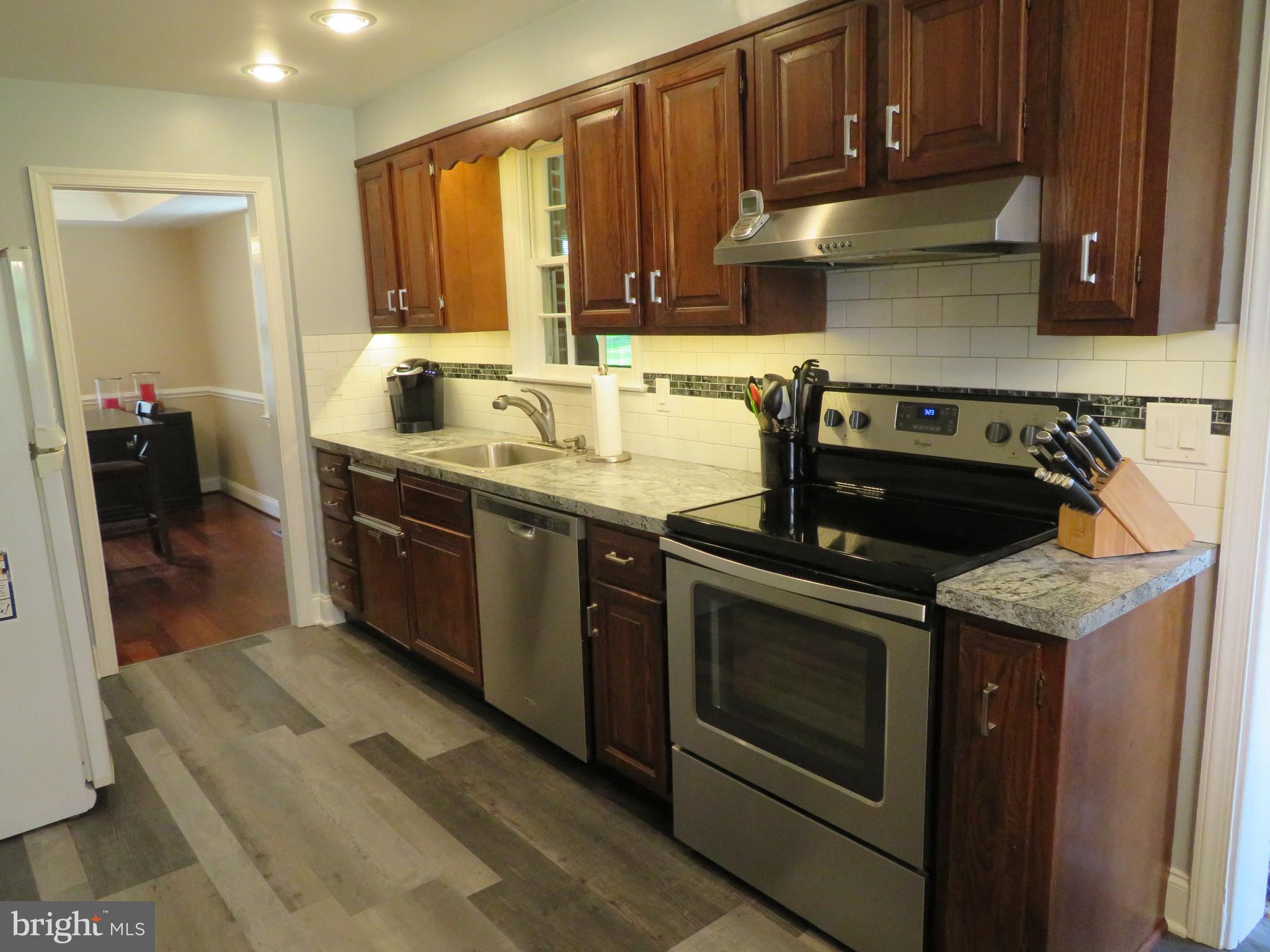 7630 Levis Road Cheltenham, PA 19012 - Photo 10 of 34 Kitchen, Stainless steel stove and dishwasher.