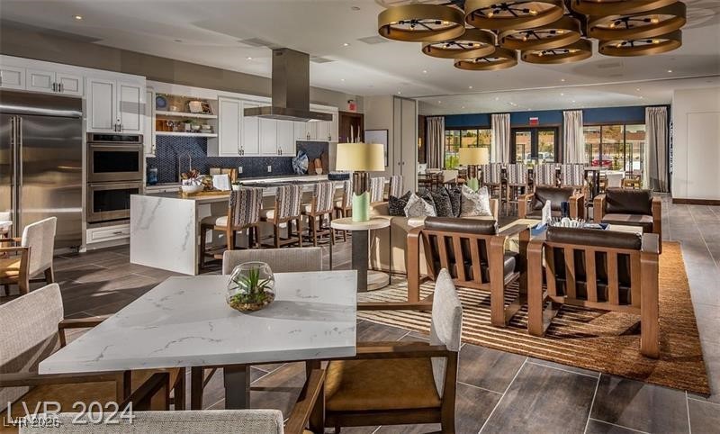 4151 Solace Street Las Vegas, NV 89135 - Photo 44 of 51 Dining room featuring recessed lighting and dark wood-type flooring