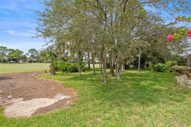 a large kitchen with kitchen island granite countertop a sink counter space and stainless steel appliances