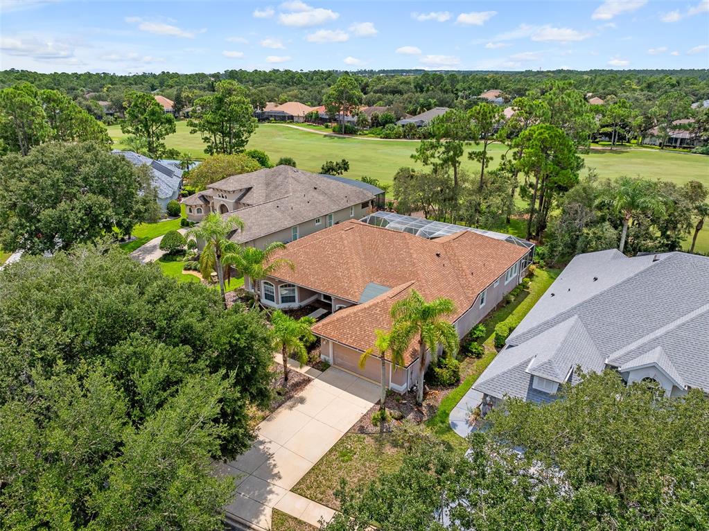 19 Lakeview Lane Palm Coast, FL 32137 - Photo 47 of 81 an aerial view of a houses with a yard