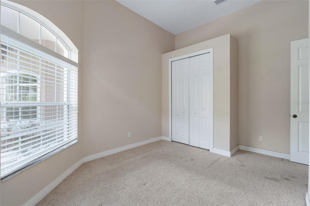19 Lakeview Lane Palm Coast, FL 32137 - Photo 68 of 81 a view of an empty room with a window