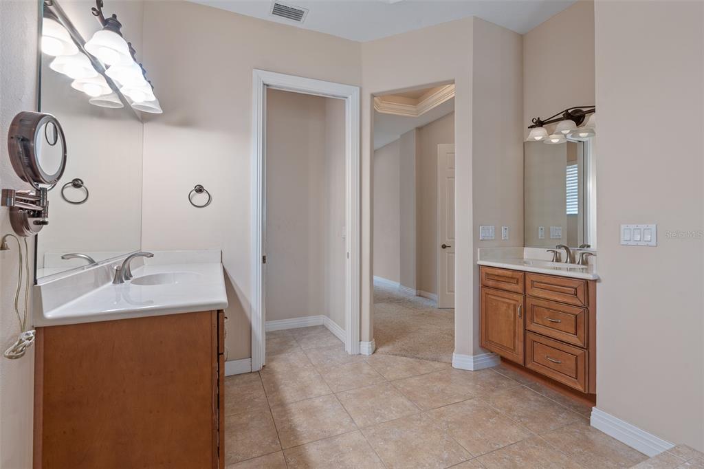 19 Lakeview Lane Palm Coast, FL 32137 - Photo 78 of 81 a bathroom with a granite countertop sink and a mirror