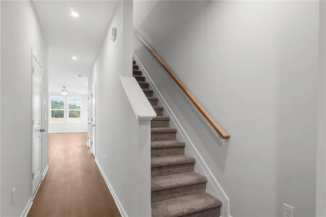 a view of an empty room and closet area