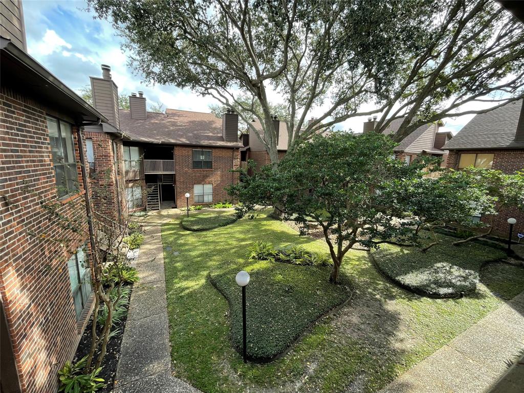 3100 Walnut Bend Lane, Unit 208 Houston, TX 77042 - Photo 1 of 17 Courtyard view from unit