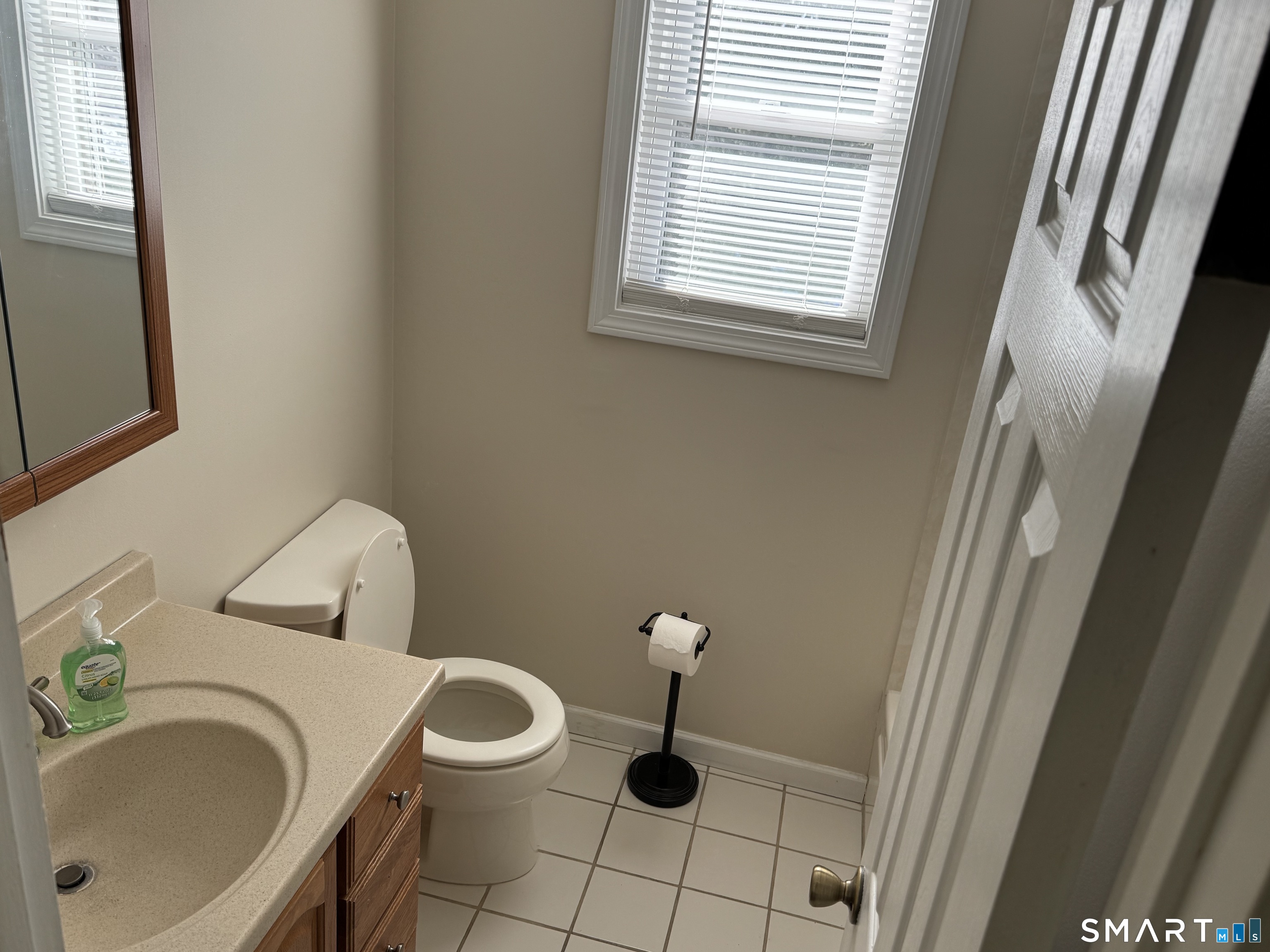 7 Bay Path Way, Unit 7 Branford, CT 06405 - Photo 12 of 14 a bathroom with a sink and a toilet