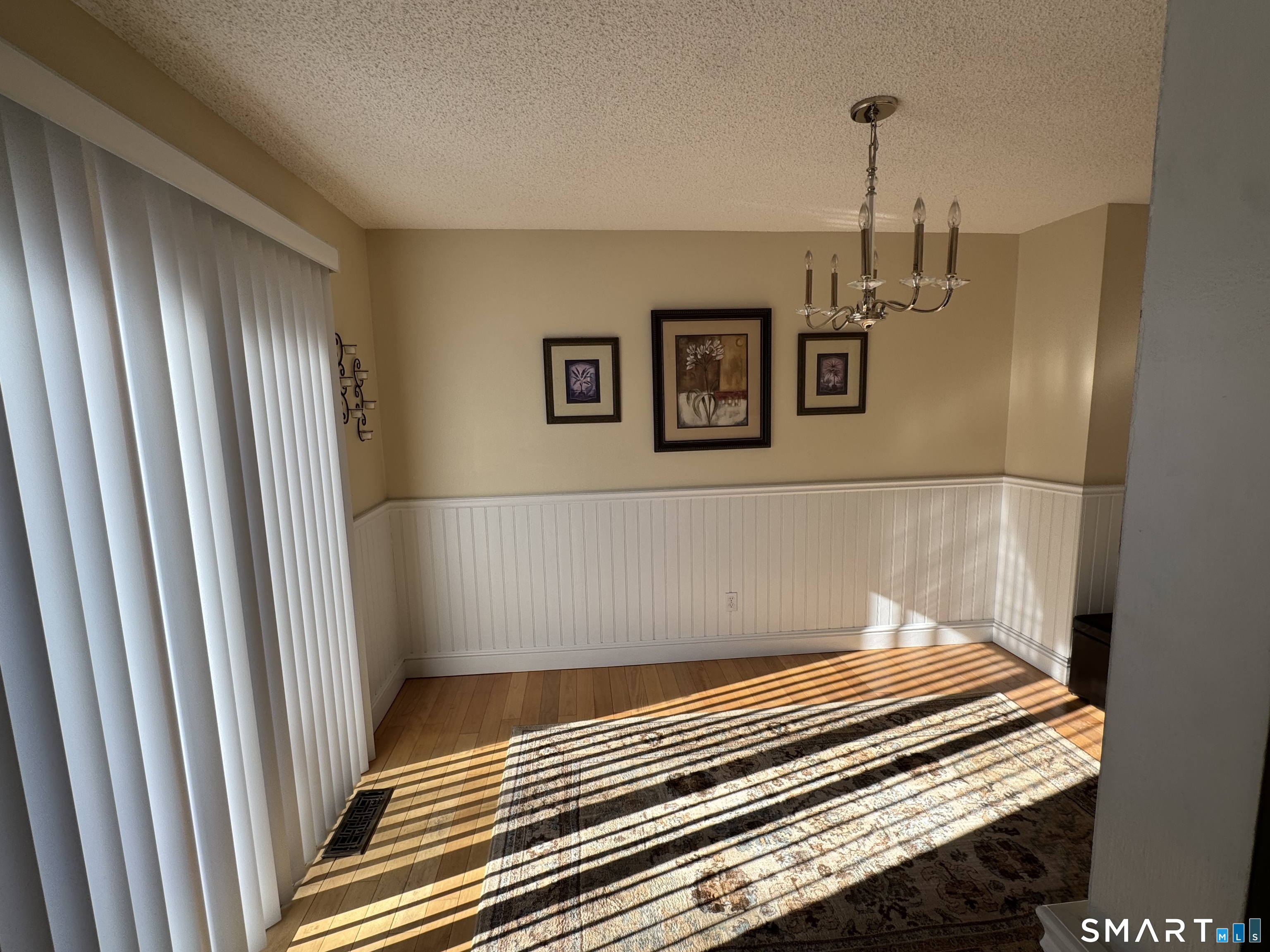 7 Bay Path Way, Unit 7 Branford, CT 06405 - Photo 4 of 14 a view of a hardwood floor and staircase