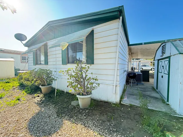 a house view with a outdoor space