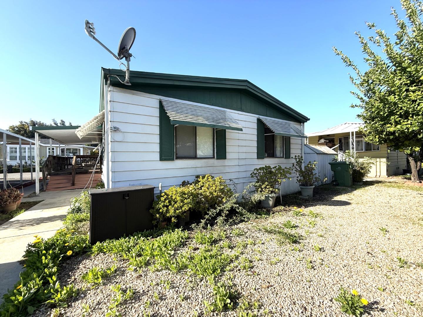5450 Monterey Road, Unit 143 San Jose, CA 95111 - Photo 3 of 21 a front view of a house with a yard