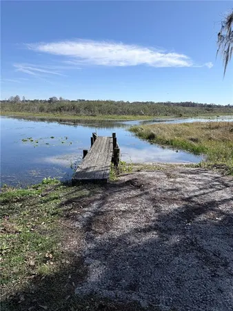 a view of a lake with outdoor space