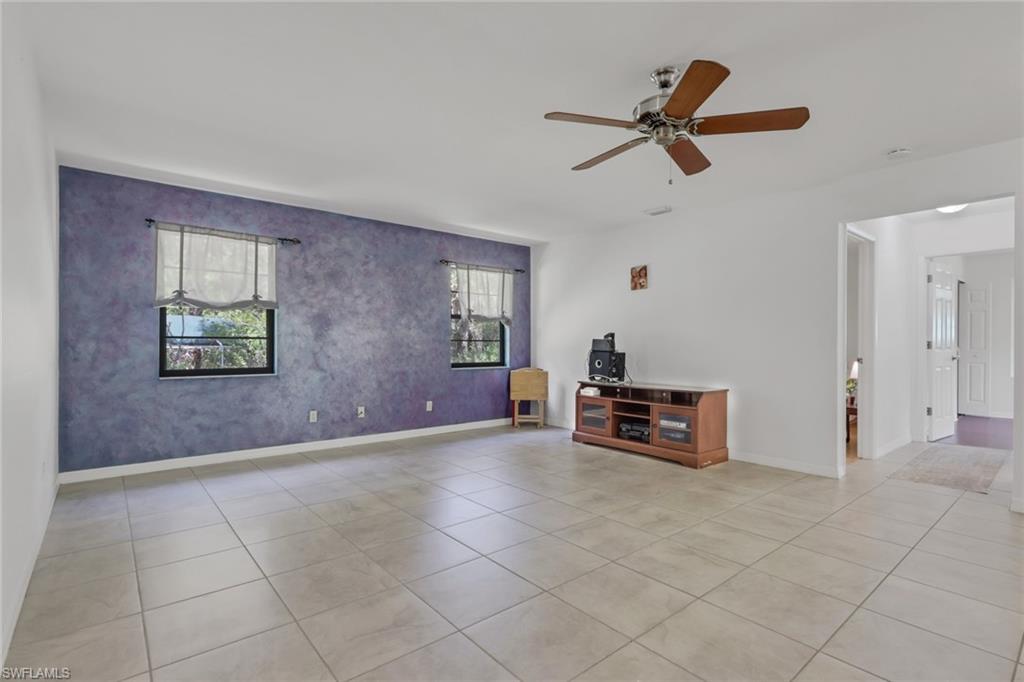 760 1st Street Northwest Naples, FL 34120 - Photo 12 of 36 a view of empty room with a ceiling fan
