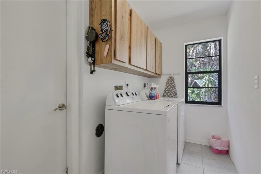 760 1st Street Northwest Naples, FL 34120 - Photo 21 of 36 a utility room with dryer and washer