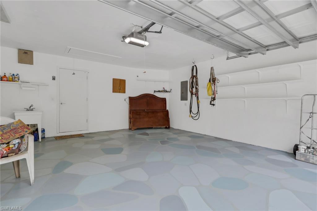760 1st Street Northwest Naples, FL 34120 - Photo 22 of 36 a view of a storage & utility room with stuff