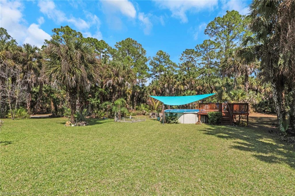 760 1st Street Northwest Naples, FL 34120 - Photo 27 of 36 an outdoor space with garden view