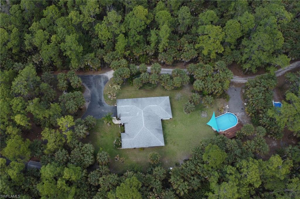 760 1st Street Northwest Naples, FL 34120 - Photo 36 of 36 an aerial view of a house with outdoor space