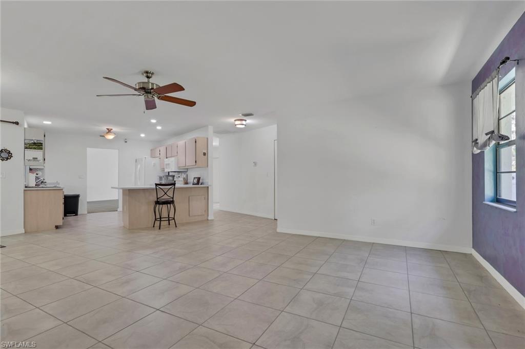 760 1st Street Northwest Naples, FL 34120 - Photo 10 of 36 a view of an empty room with a window