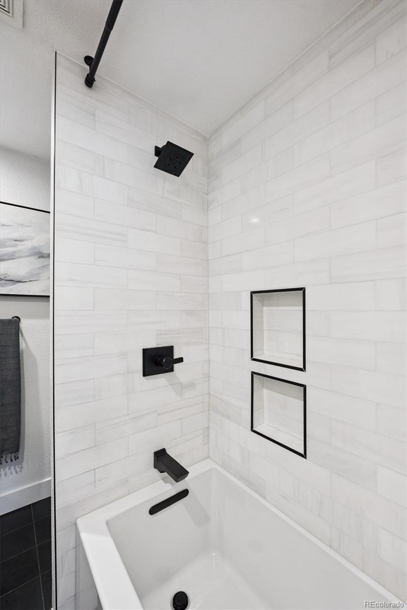 3675 South Hibiscus Way Denver, CO 80237 - Photo 21 of 50 a bathroom with a sink and a mirror