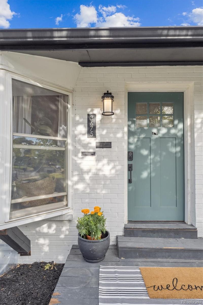 3675 South Hibiscus Way Denver, CO 80237 - Photo 3 of 50 a view of a entryway door of the house