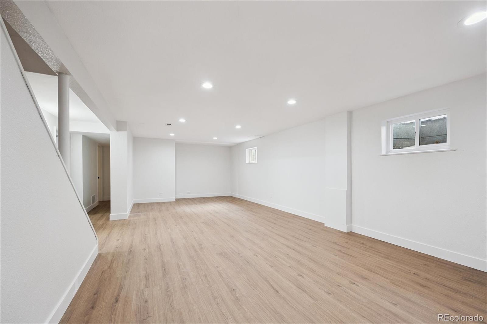3675 South Hibiscus Way Denver, CO 80237 - Photo 33 of 50 wooden floor in an empty room with a window