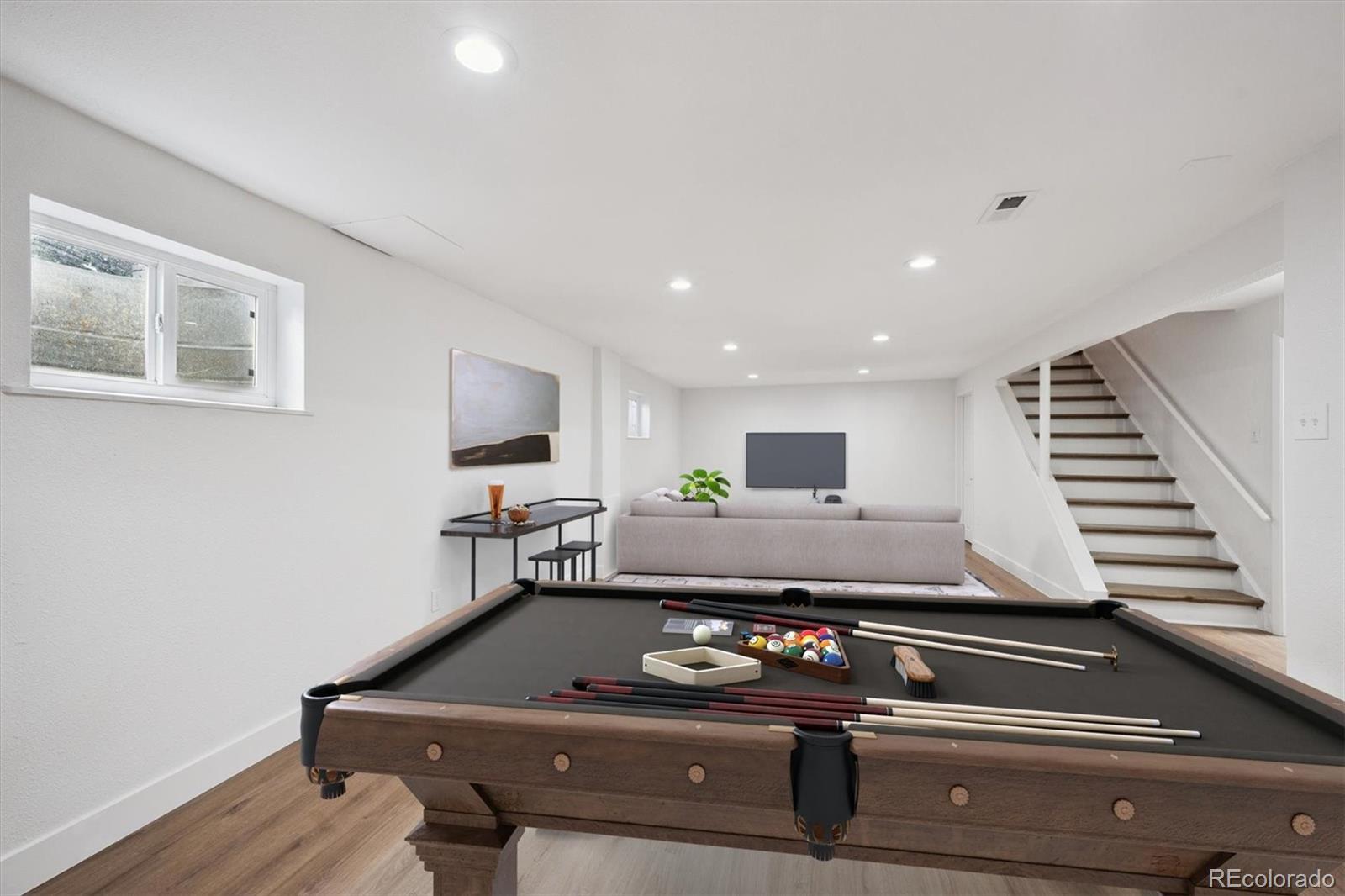 3675 South Hibiscus Way Denver, CO 80237 - Photo 35 of 50 a room with furniture pool table and a flat screen tv