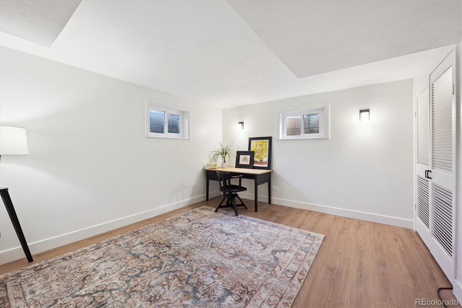 3675 South Hibiscus Way Denver, CO 80237 - Photo 37 of 50 a view of a livingroom with furniture and a window