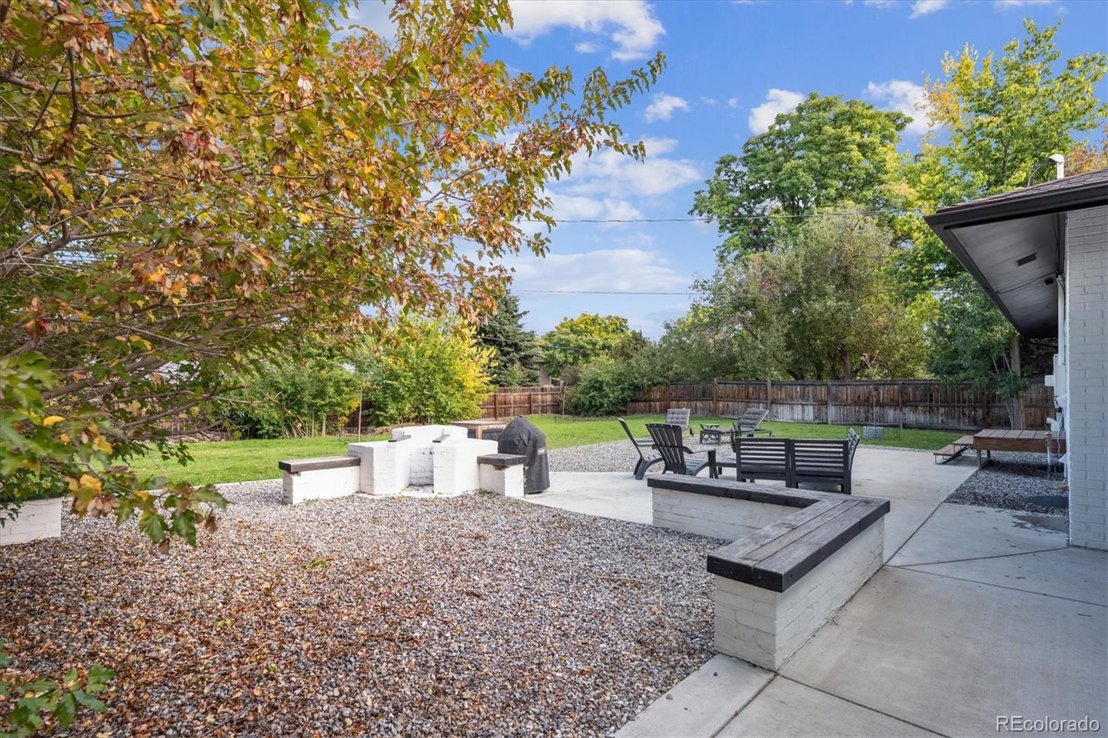 3675 South Hibiscus Way Denver, CO 80237 - Photo 45 of 50 a view of a backyard with sitting area