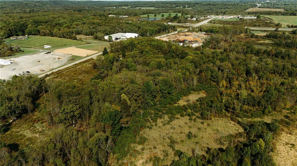 1039 Perry Highway Mercer, PA 16137 - Photo 2 of 6 an aerial view of residential houses with outdoor space and trees