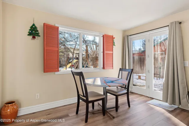 a view of entryway with wooden floor