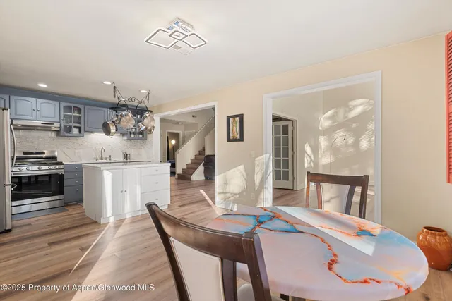 a living room with furniture fireplace and flat screen tv