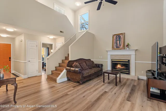 a bedroom with a bed and flat screen tv
