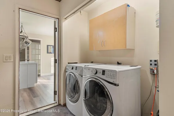 a view of utility room with washer and dryer