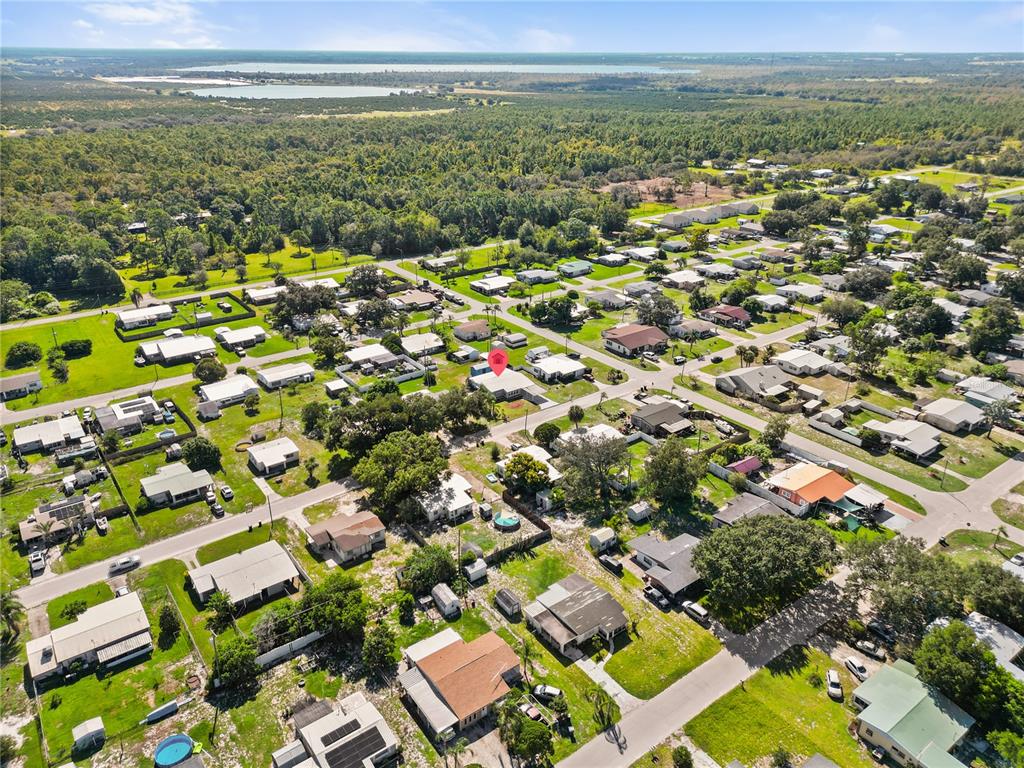 319 Thomas Avenue Frostproof, FL 33843 - Photo 45 of 47 an aerial view of residential houses with outdoor space