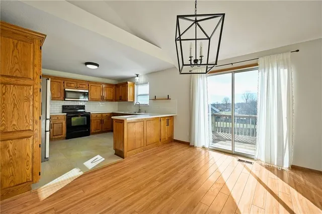 $320,000 | 109 East Heritage Drive, Raymore, MO 64083