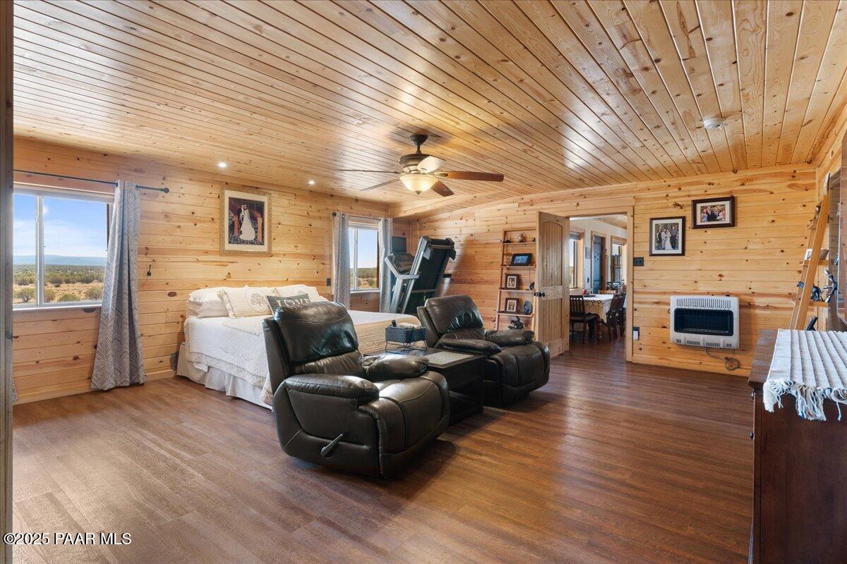 0 Juniperwood Ranch Ash Fork, AZ 86320 - Photo 17 of 35 a living room with furniture and a fireplace