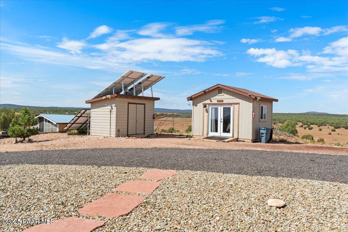 0 Juniperwood Ranch Ash Fork, AZ 86320 - Photo 25 of 35 front view of a house with a road