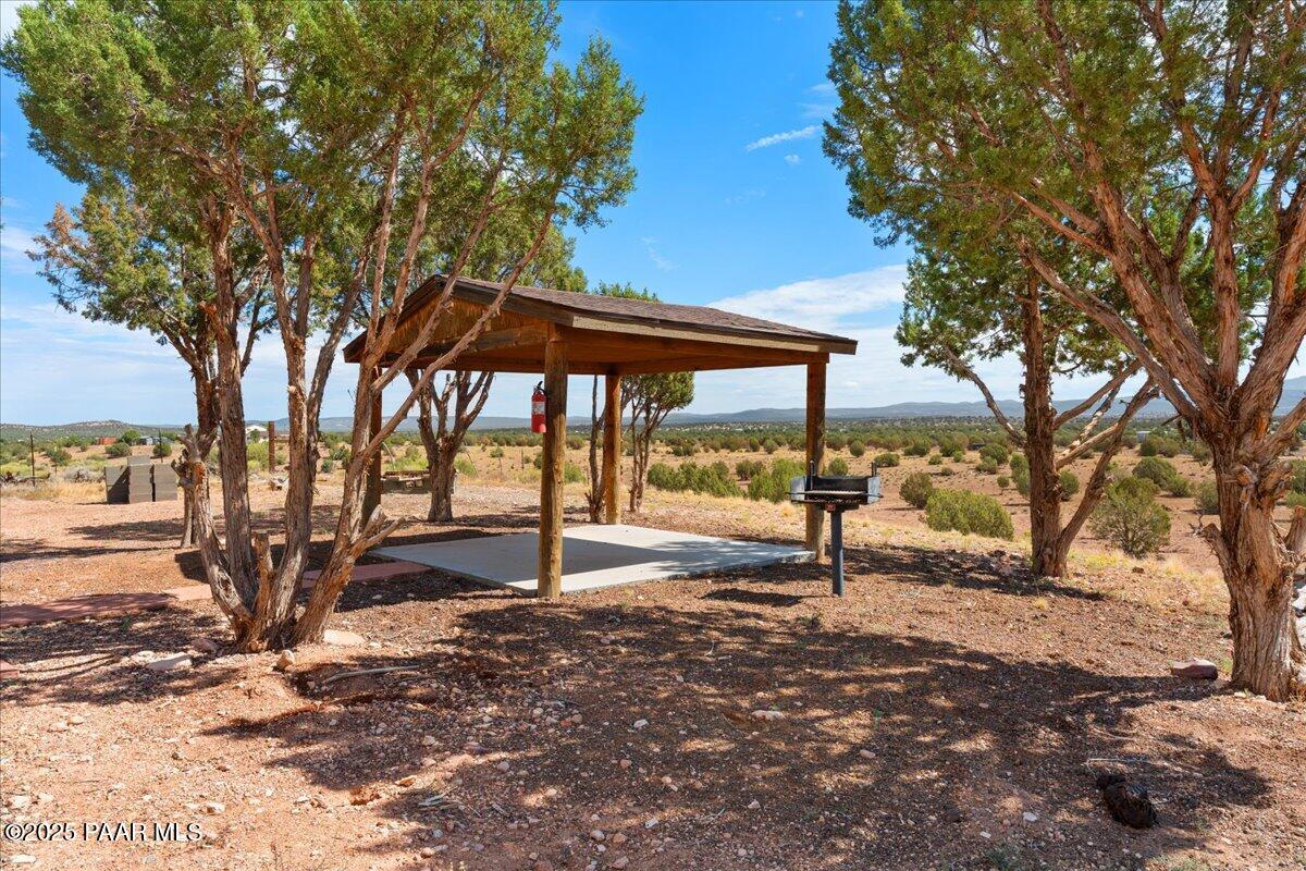 0 Juniperwood Ranch Ash Fork, AZ 86320 - Photo 5 of 35 a backyard of a house with lots of green space