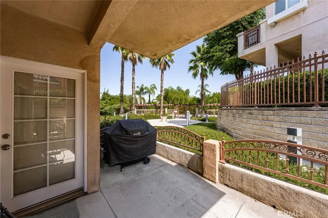 a view of a balcony with chairs