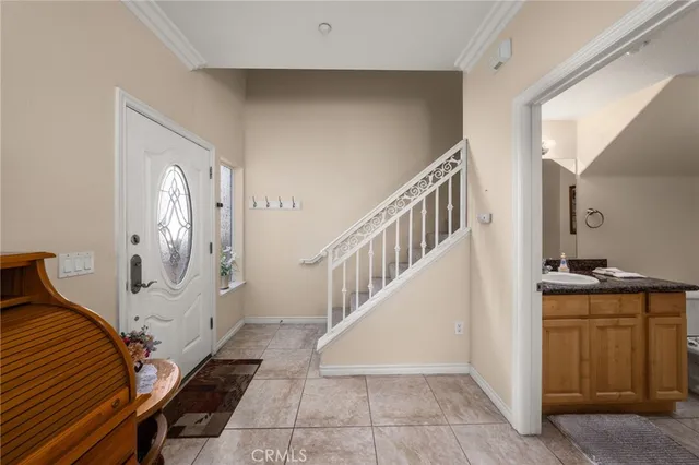 a view of a hallway view with staircase