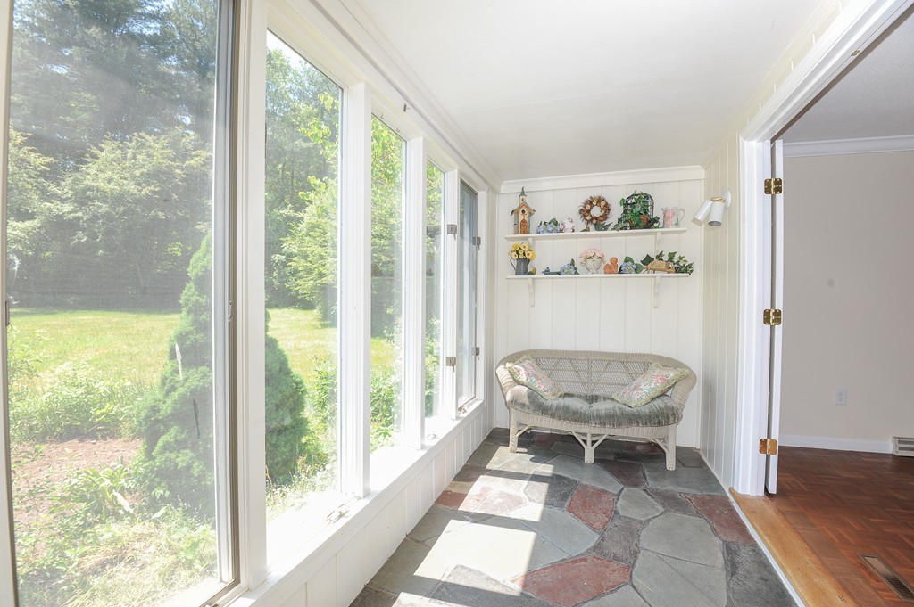 41 Chapel Road Amherst, MA 01002 - Photo 11 of 30 a living room with furniture and a large window